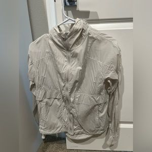 Lululemon travel wind breaker- beige with pinkish tint
